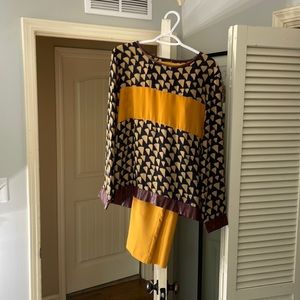 Matching business professional outfit. Burnt yellow and faux leather.